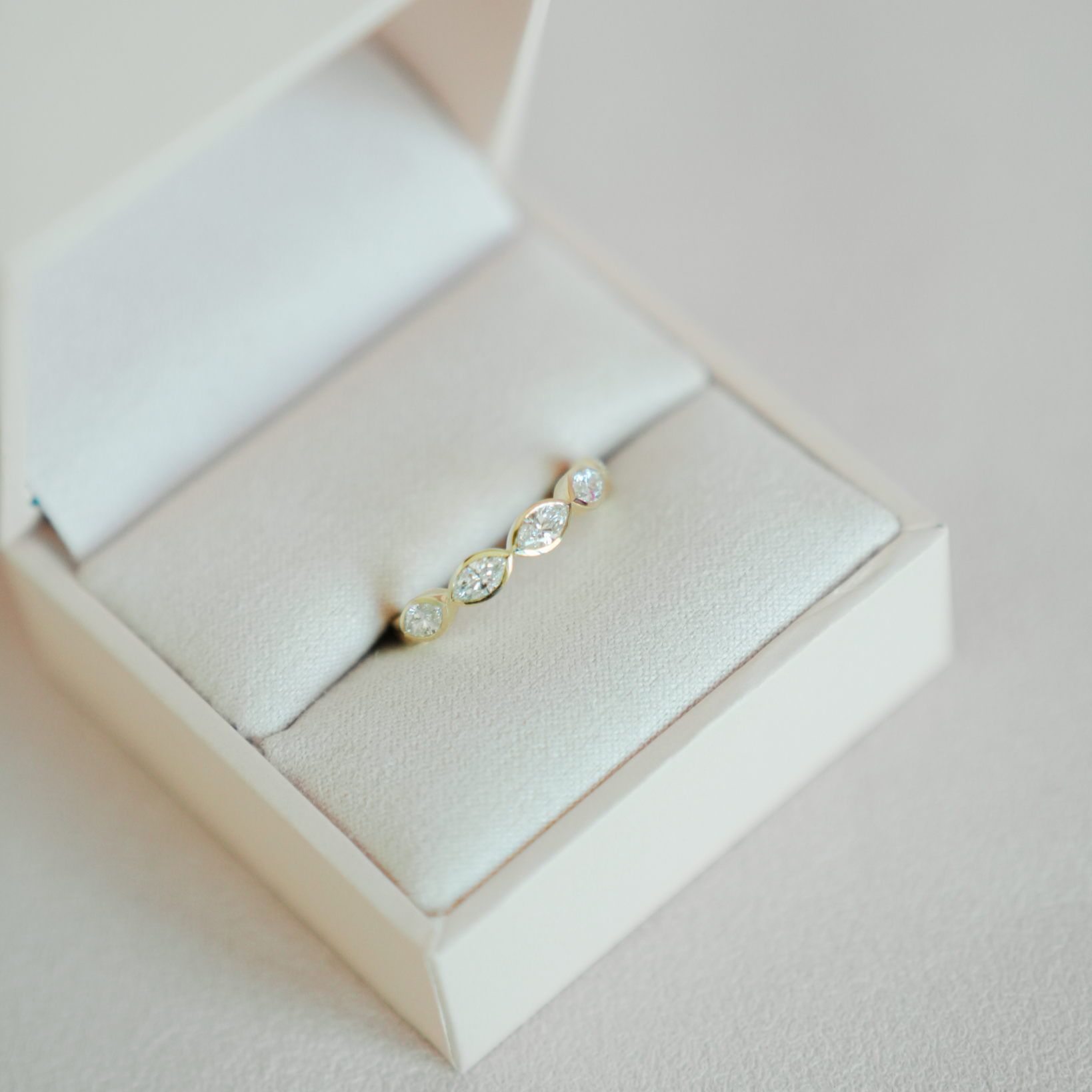 East West Bezel Marquise Band