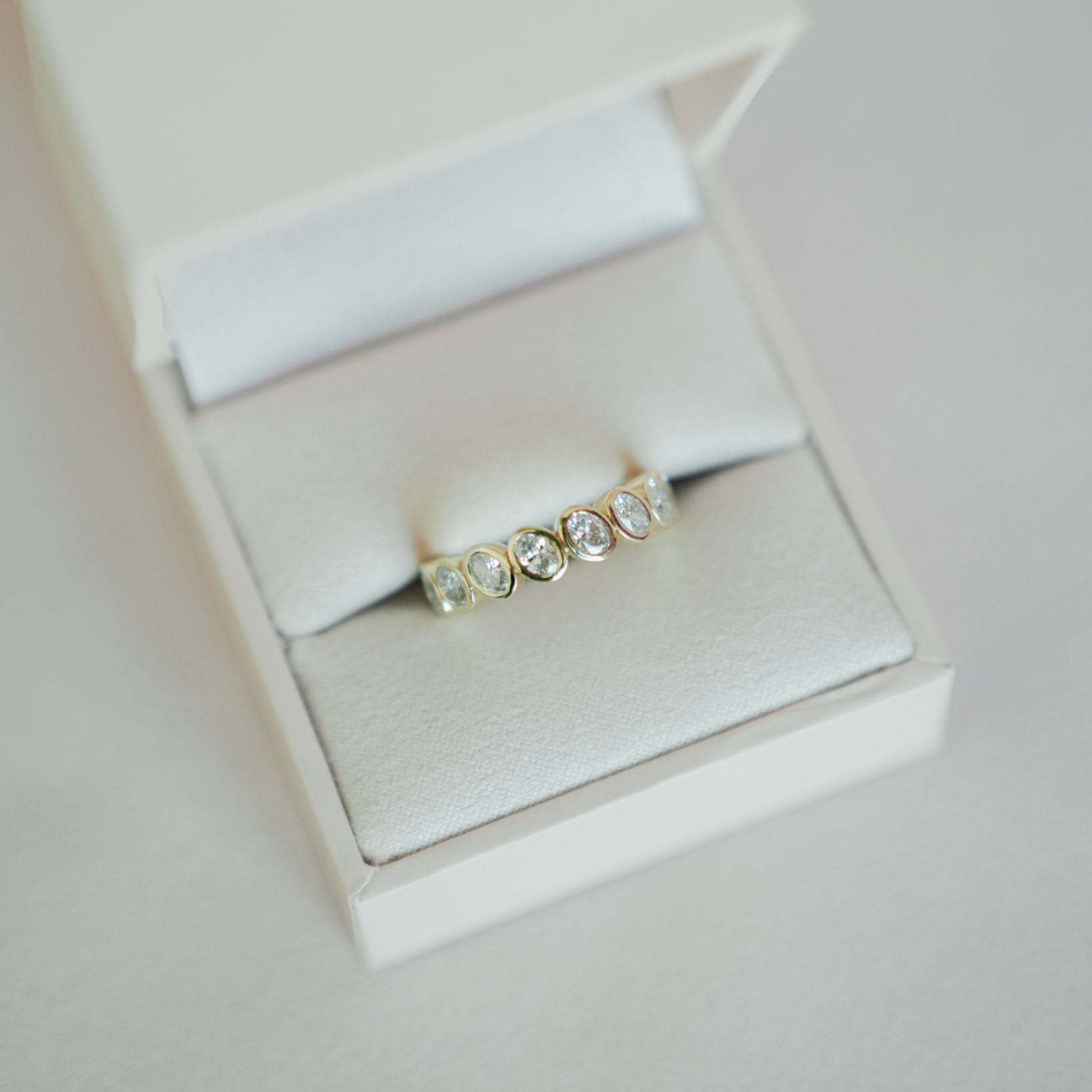 Tilted Ovals Eternity Band
