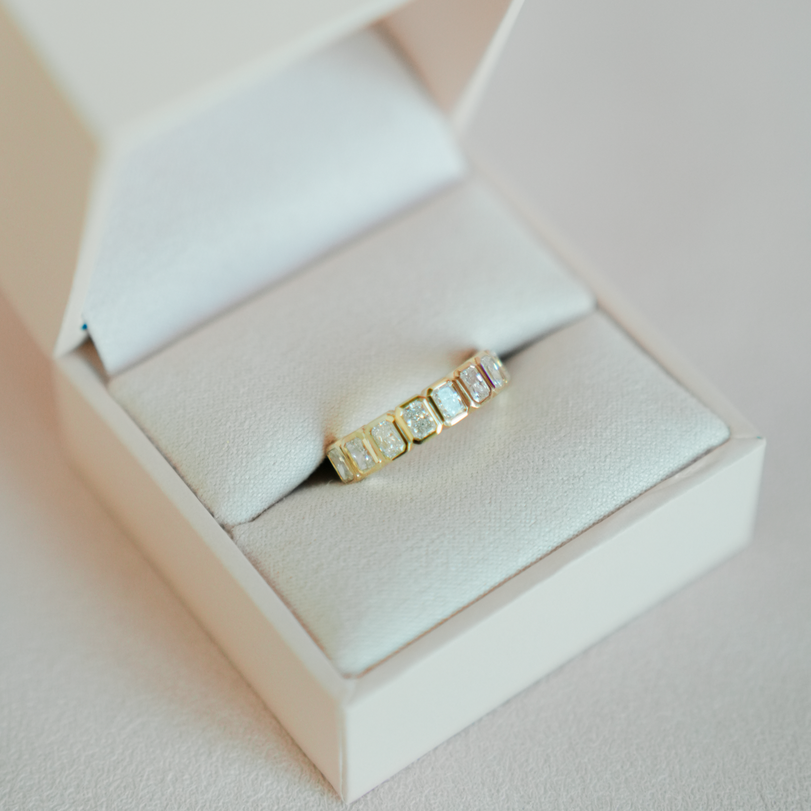 Bezeled Emeralds Band